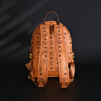 Mcm Stark Visetos Medium Backpack – Cognac Monogram with Gold-Tone Studs - Cognac with Black Monogram Print — view 4