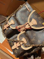 LV Excursion PM Monogram Canvas Backpack Shoulder Bag with Leather Trim and Drawstring Closure — view 1