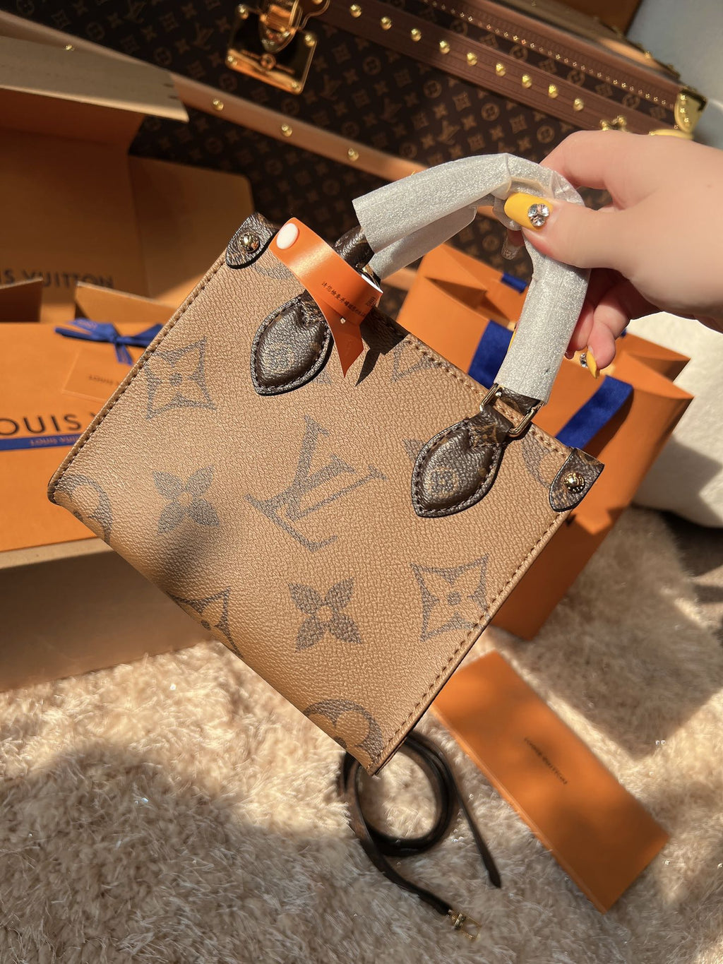 LV OnTheGo PM Monogram Reverse Canvas Tote Handle Bag with Leather Trim and Shoulder Strap — view 1