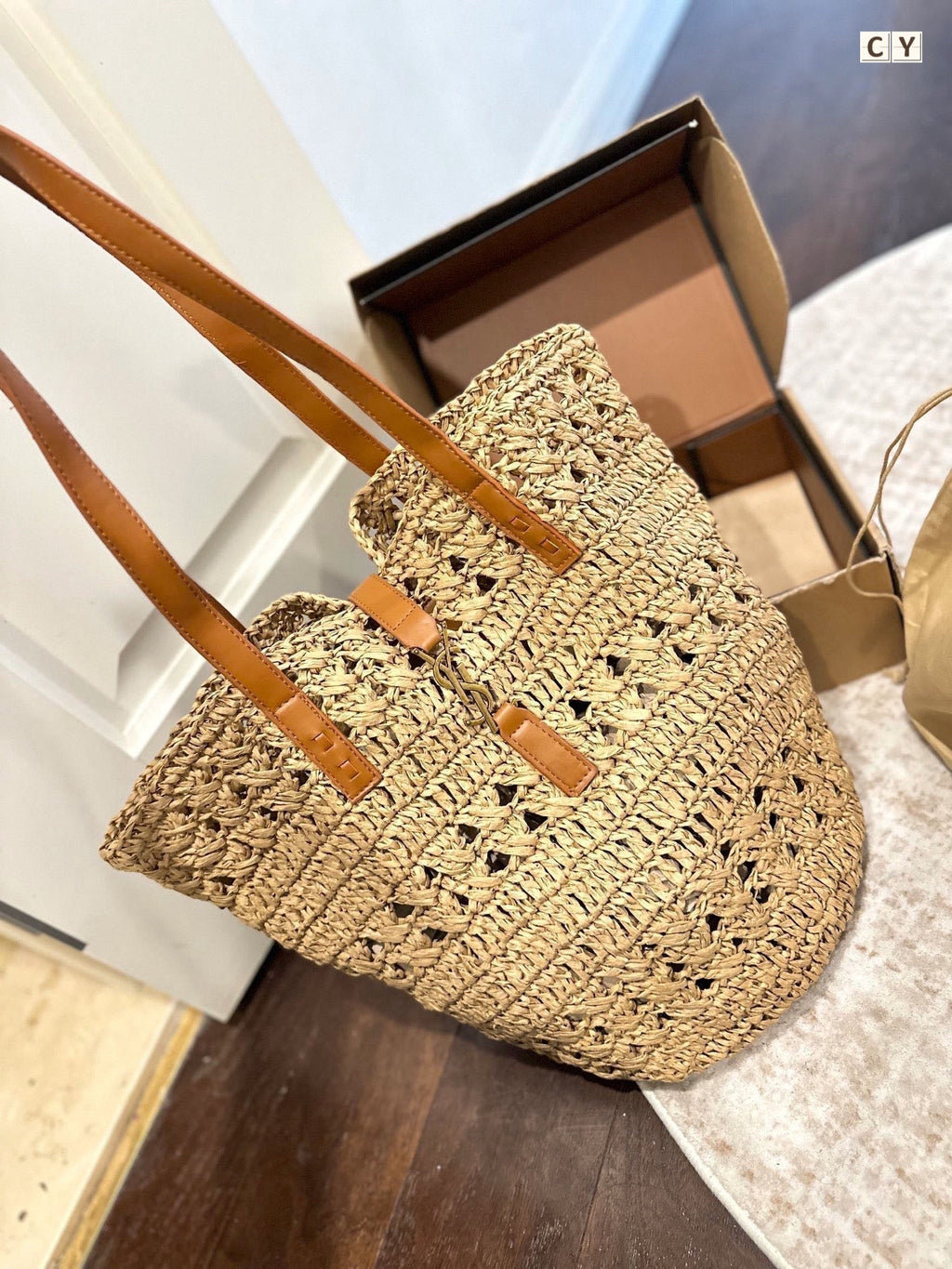 YSL Panier Medium in Raffia and Vegetable-Tanned Leather Tote Bag - Yellow — view 1