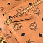 Mcm Stark Visetos Medium Backpack – Cognac Monogram with Gold-Tone Studs - Cognac with Black Monogram Print — view 9