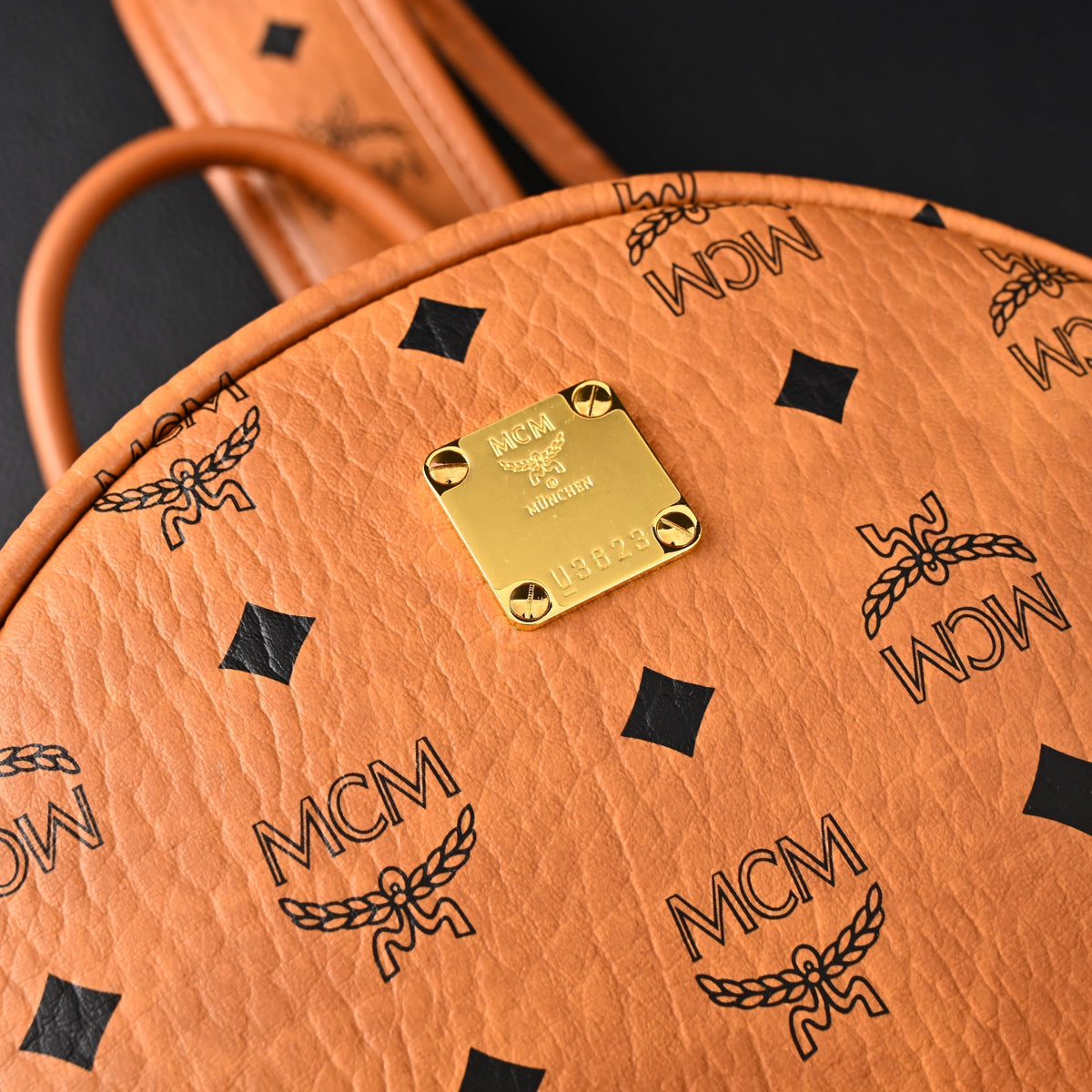 Mcm Stark Visetos Medium Backpack – Cognac Monogram with Gold-Tone Studs - Cognac with Black Monogram Print — view 10