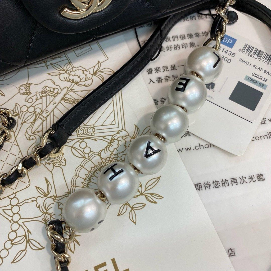 Chanel Pearl Logo Strap Flap Bag Black — view 7