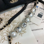Chanel Pearl Logo Strap Flap Bag Black — view 7
