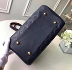 LV Montaigne MM Monogram Empreinte Leather Handle Shoulder Bag with Navy Blue Leather Trim and Shoulder Strap — view 5