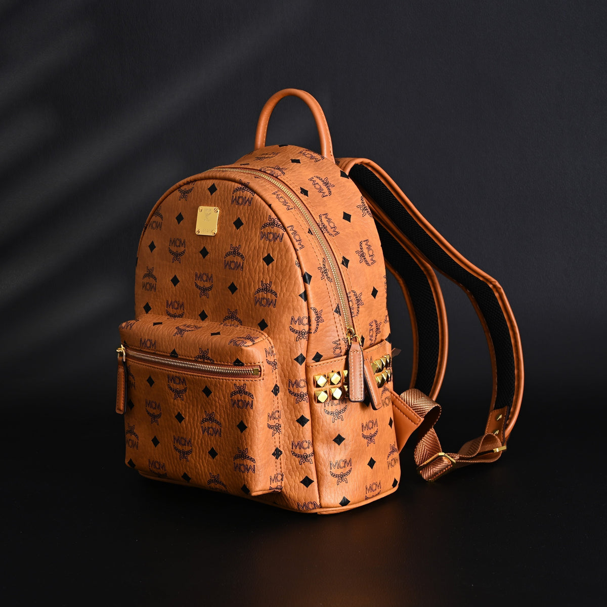 Mcm Stark Visetos Medium Backpack – Cognac Monogram with Gold-Tone Studs - Cognac with Black Monogram Print — view 3
