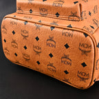 Mcm Stark Visetos Medium Backpack – Cognac Monogram with Gold-Tone Studs - Cognac with Black Monogram Print — view 8