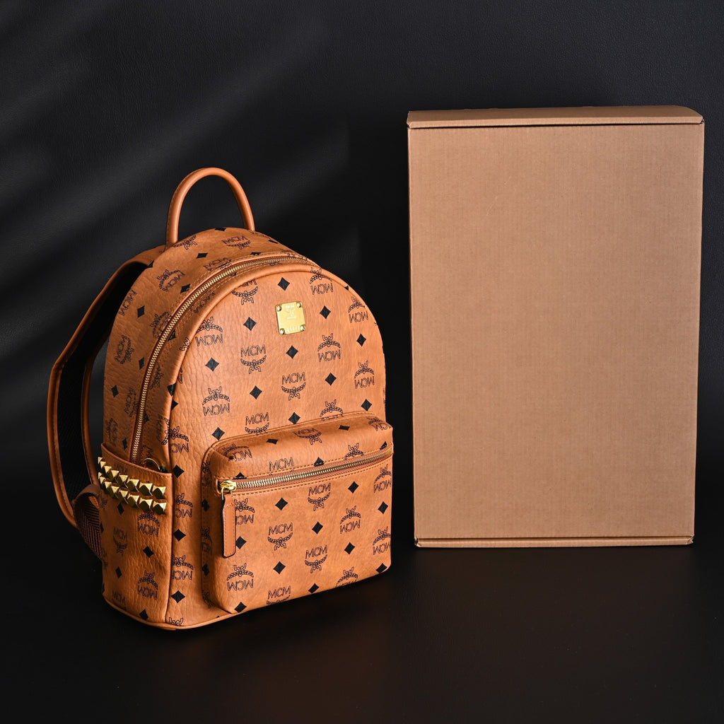 Mcm Stark Visetos Medium Backpack – Cognac Monogram with Gold-Tone Studs - Cognac with Black Monogram Print — view 7