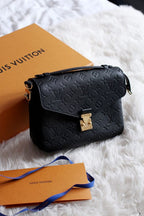 LV Pochette Métis Monogram Empreinte Leather Handle Crossbody Bag with Navy Blue Leather Trim — view 2