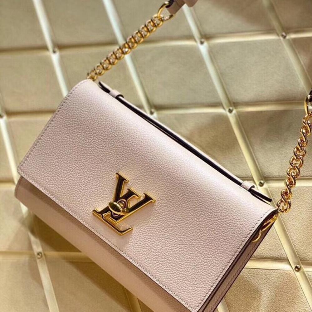 LV Twist Chain Wallet Light Pink Grain Leather — view 1