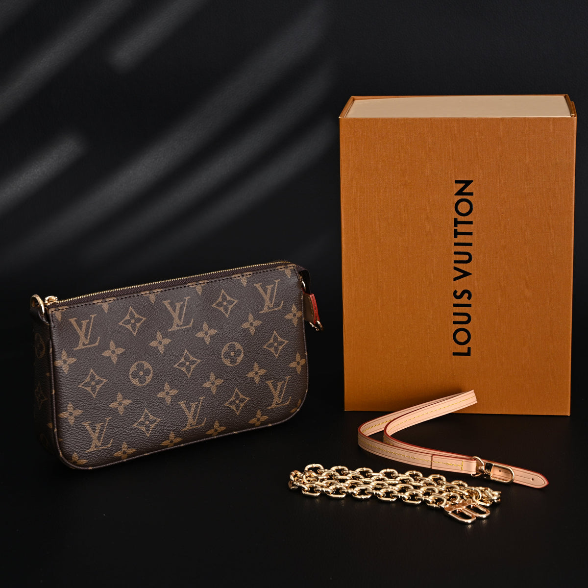 Louis Vuitton Pochette Accessoires Monogram Canvas Clutch Bag – Brown with Gold Chain (M82766) — view 1