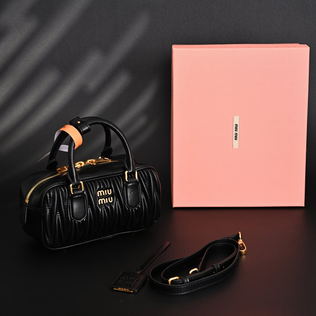Miu Miu Black Matelassé Leather Top Handle Bag — view 1