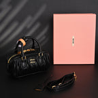 Miu Miu Black Matelassé Leather Top Handle Bag — view 1