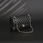 Chanel Classic Flap Bag – Black Quilted Caviar Leather with Gold-Tone Hardware — view 9