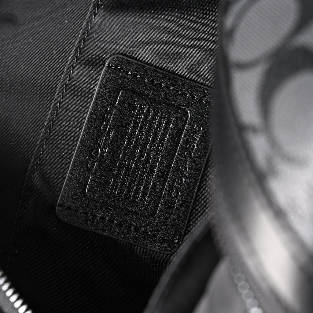 Coach Signature Duffel Bag – Black Monogram Canvas with Leather Trim — view 2