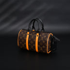 Louis Vuitton Keepall Bandoulière 50 – Monogram Canvas with Neon Orange Trim Travel Bag — view 11