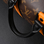 Louis Vuitton Keepall Bandoulière 50 – Monogram Canvas with Neon Orange Trim Travel Bag — view 9