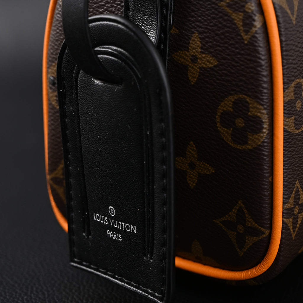 Louis Vuitton Keepall Bandoulière 50 – Monogram Canvas with Neon Orange Trim Travel Bag — view 21