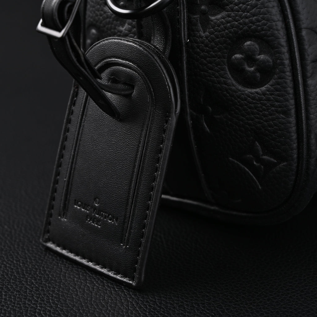 Louis Vuitton Keepall Bandoulière 50 – Monogram Shadow Black Leather Travel Bag — view 2
