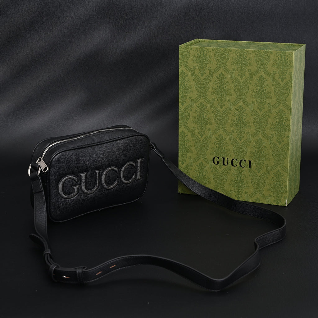 Gucci Black Leather Embossed Logo Belt Bag — view 1