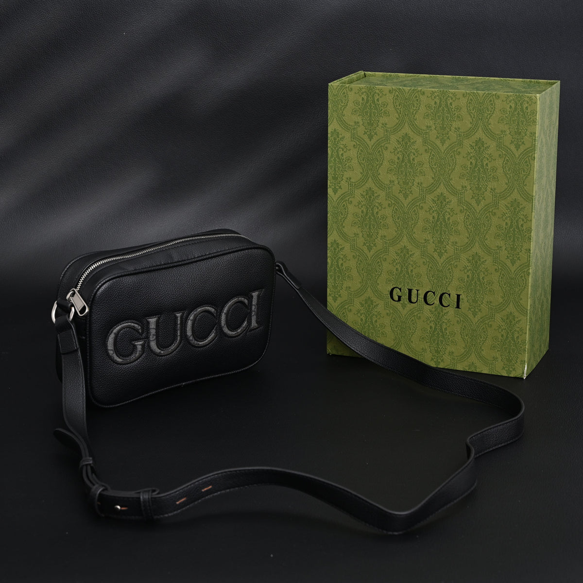 Gucci Black Leather Embossed Logo Belt Bag — view 1