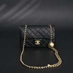 Chanel Classic Flap Mini Bag – Black Quilted Lambskin with Gold-Tone Hardware — view 16