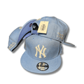 New York Yankees with Cream Embroidered Logo and Script Detail Light Blue – Snapback Cap — view 1