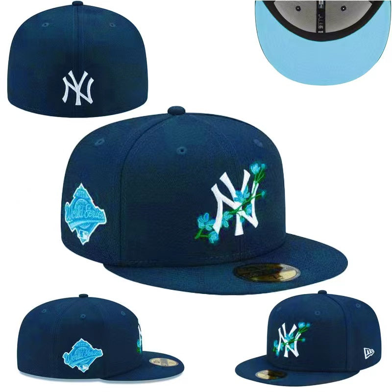 New York Yankees 59FIFTY Fitted Hat with Blue Floral Embroidery and World Series Patch – Royal Blue — view 1