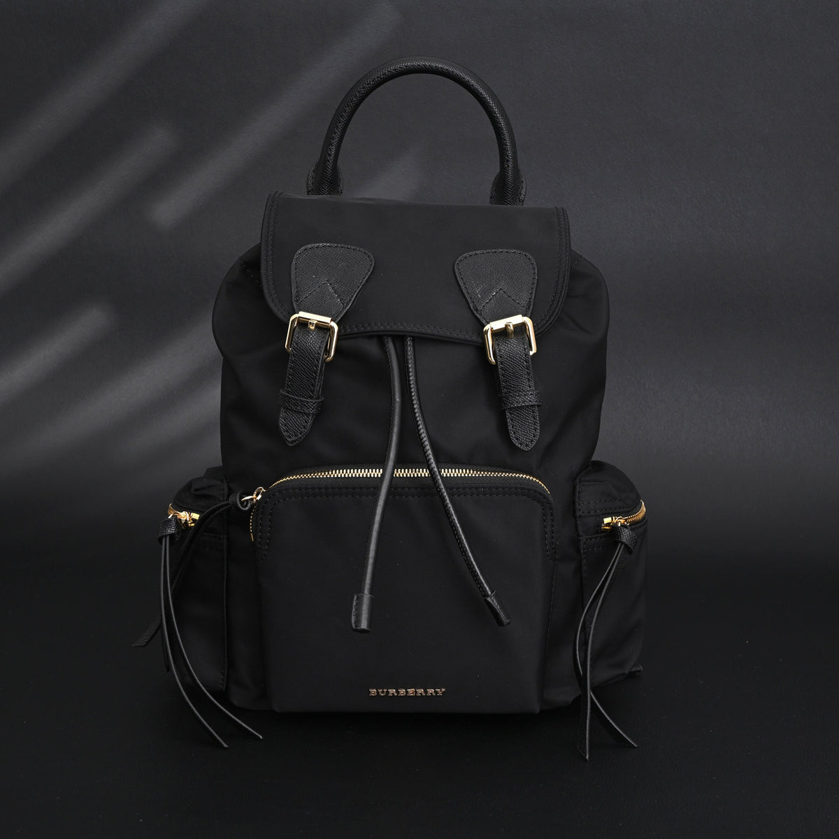 Burberry the Rucksack – Black Nylon & Leather Backpack with Gold-Tone Hardware - Black with Gold Accents — view 1