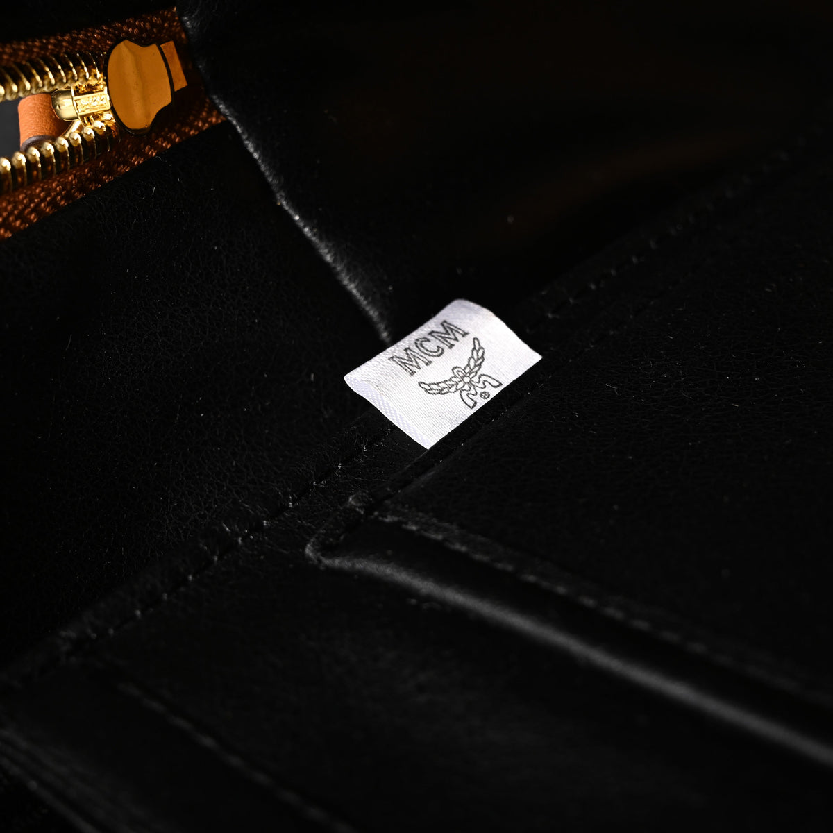 Mcm Stark Visetos Medium Backpack – Cognac Monogram with Gold-Tone Studs - Cognac with Black Monogram Print — view 2