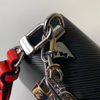 LV Twist MM Epi Leather Handle Crossbody Bag with LV Twist Lock and Love Lock Charms — view 6